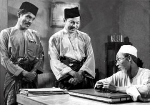 Kuala Lumpur 06 May 2014. Labu (M. Zain) and Labi (P. Ramlee) with a kadi (Aziz Sattar) in the movie "Nasib Si-Labu Labi,pada tahun 1968.Recopy